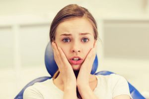 young-woman-anxious-orthodoniics-dental