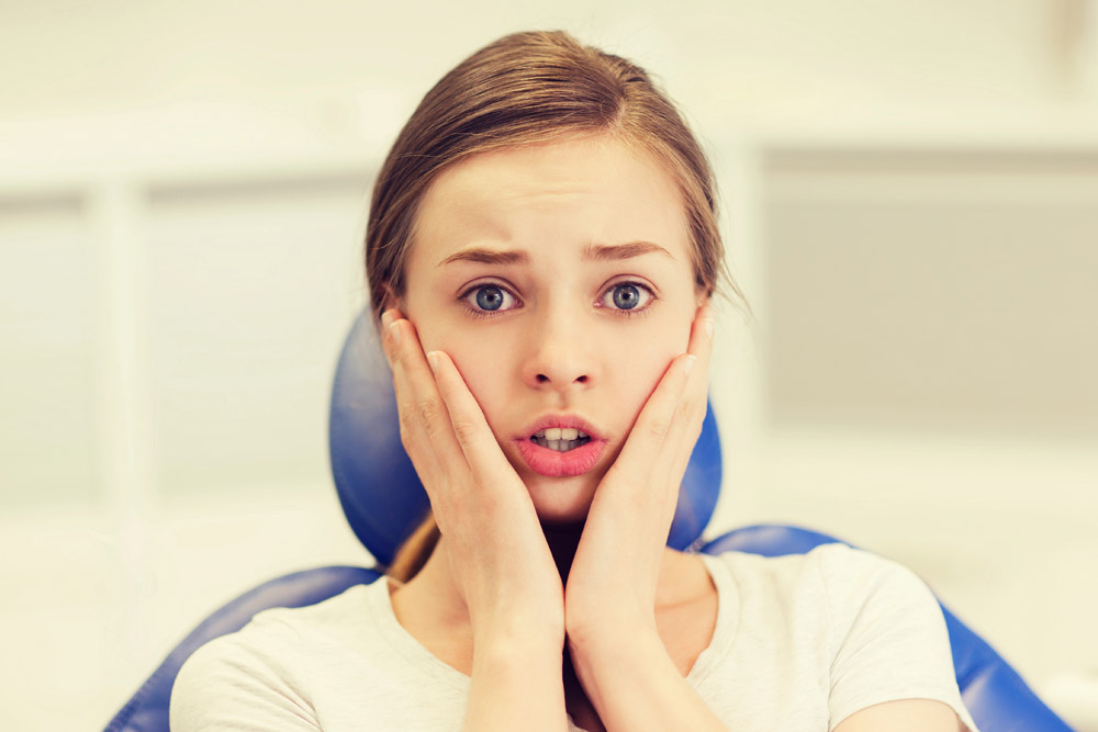 young-woman-anxious-orthodoniics-dental
